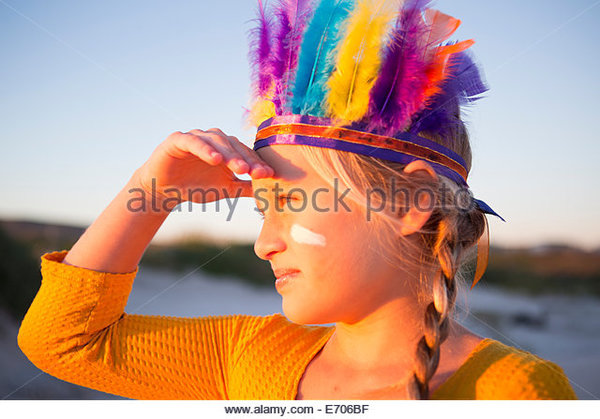 0_1504607941621_close-up-of-girl-dressed-as-native-american-in-feather-headdress-with-e706bf.jpg